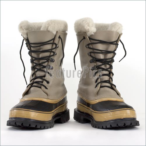 Pair Of Heavy Snow Boots On White Background Low Angle Perspective