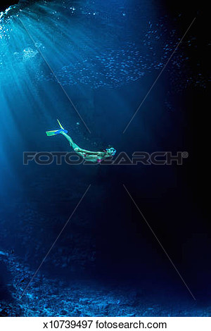 Picture   Female Snorkeler Exploring An Underwater Cave  Fotosearch