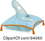 Glass Slipper On A Pillow Over Blue Pair Of Glass Princess Slippers