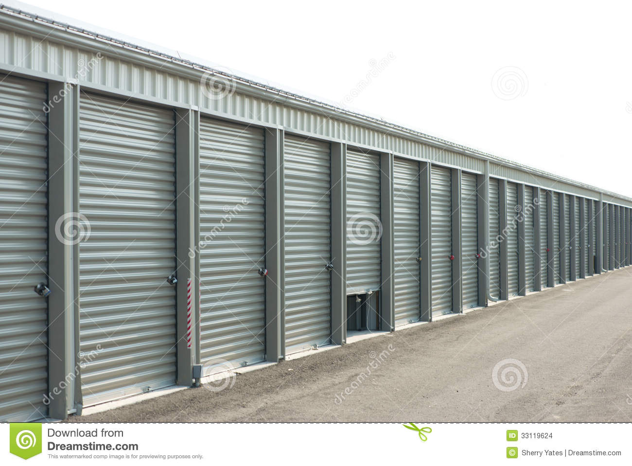 Storage Units At A Storage Facility With One Door Parially Open