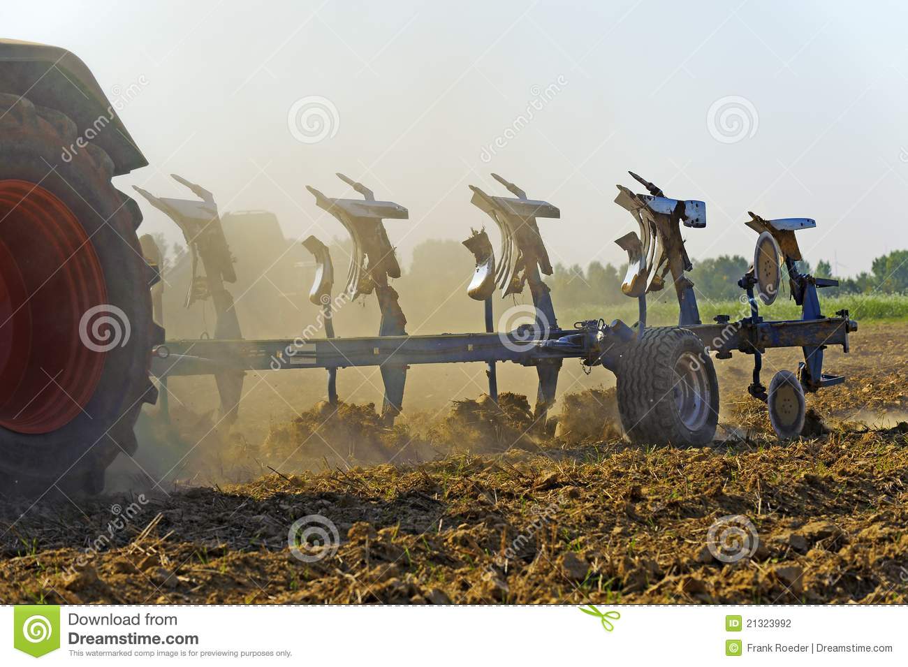 Plow Behind A Tractor Stock Photography   Image  21323992