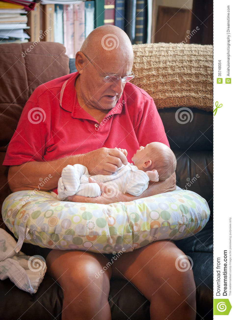 Lap  Grandfather Is Talking And Grandson Is Looking At Him