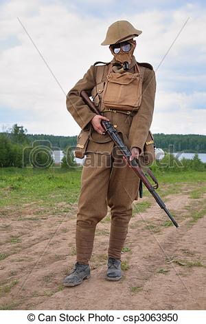 Stock Photo   Soldier Of Ww1 In A Gas Mask Hold A Rifle   Stock Image