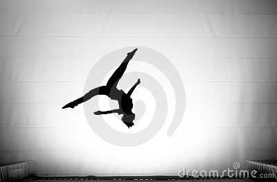 The Splits In Somersault On Trampoline Royalty Free Stock Image