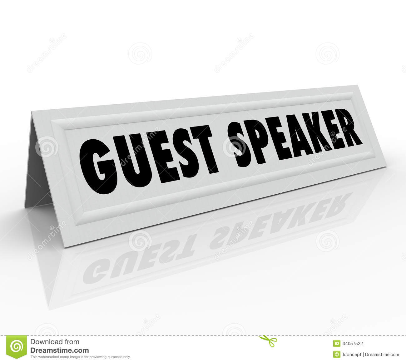 The Words Guest Speaker On A Paper Folded Tent Card To Illustrate The