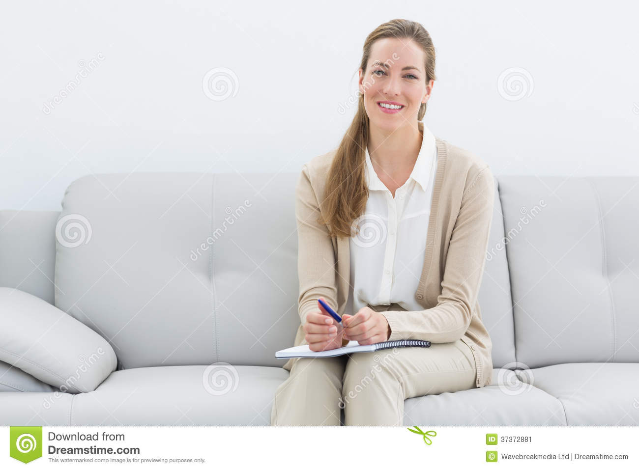 Smiling Female Psychologist Sitting On Sofa Stock Image   Image