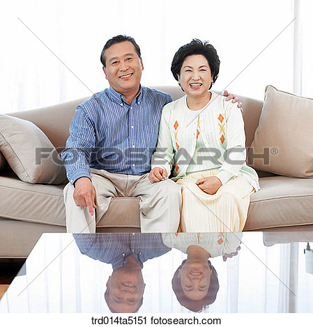 Stock Photography   An Old Couple On A Sofa  Fotosearch   Search Stock