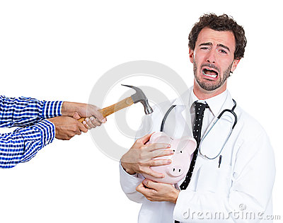 Professional Doctor Nurse With Stethoscope Protecting Piggy Bank