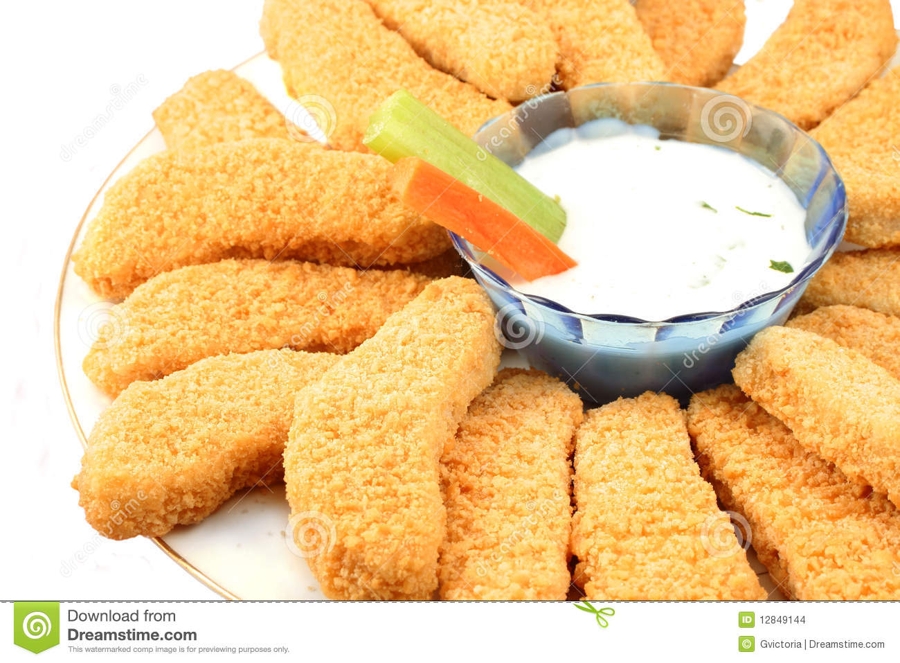     Crispy Chicken Fingers With Vegetables And Dip On A White Background