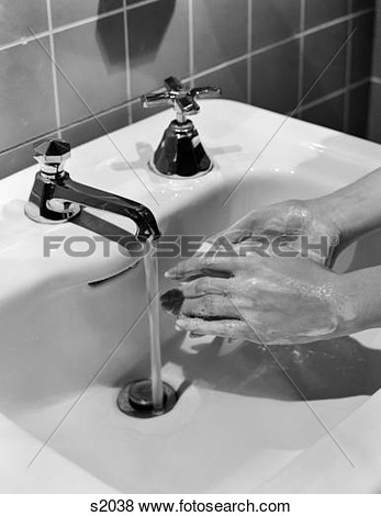 Woman S Hands Lathering Up With Bar Of Soap Under Bathroom Faucet