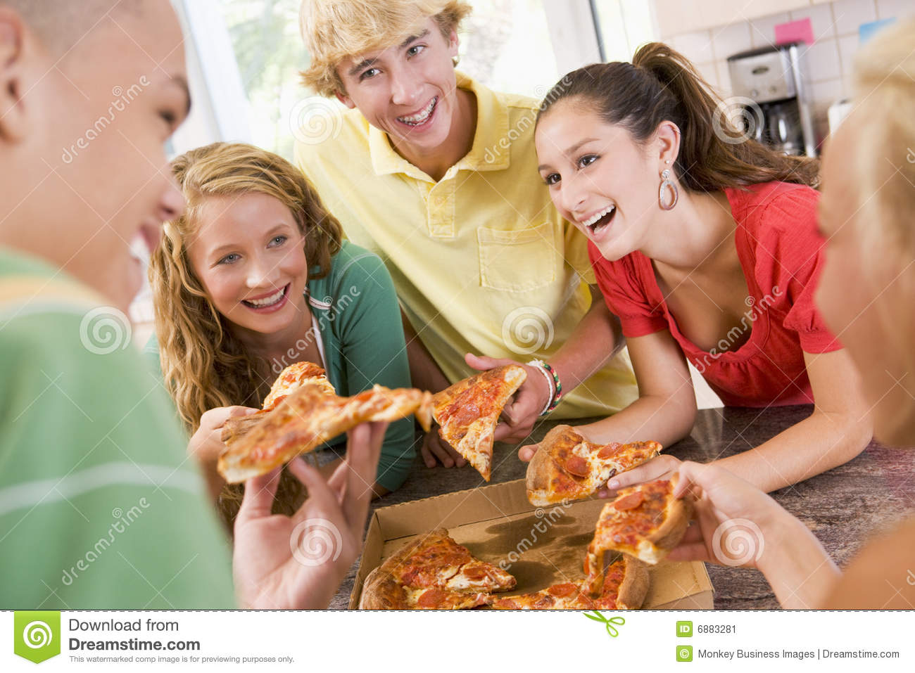 Group Of Teenagers Eating Pizza Stock Image   Image  6883281