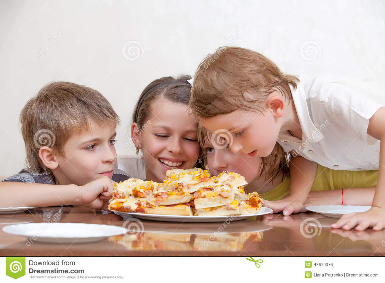 Stock Photo  Group Of Kids Eating Pizza And Smiling