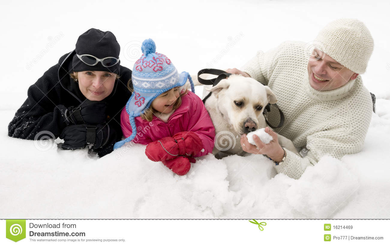 Family With Dog Playing In Snow Royalty Free Stock Images   Image