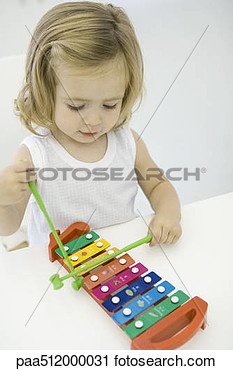 Stock Photography Of Toddler Girl Playing Xylophone High Angle View    