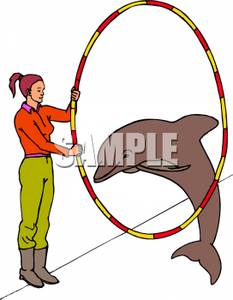 Clipart Image Of A Dolphin Jumping Through A Hoop Held By A Woman