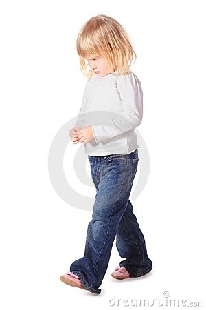 Little Girl Wearing Jeans And Shirt Is Walking Stock Photos   Image