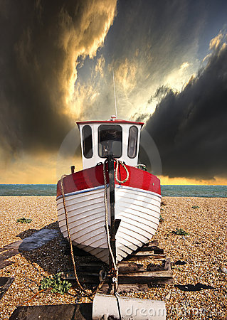 Fishing Boat Beached And Waiting For The Tide In Hythe England With
