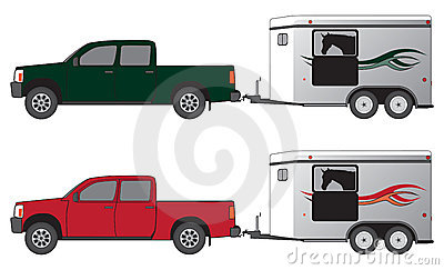 Pickup Pulling Horse Trailer With Horse Silhouetted In Trailer Window