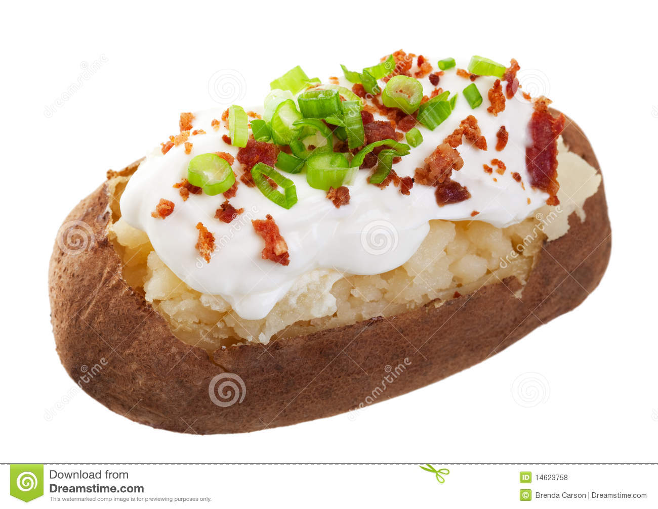 Baked Potato Loaded With Sour Cream Bacon Bits And Chives  Shot On