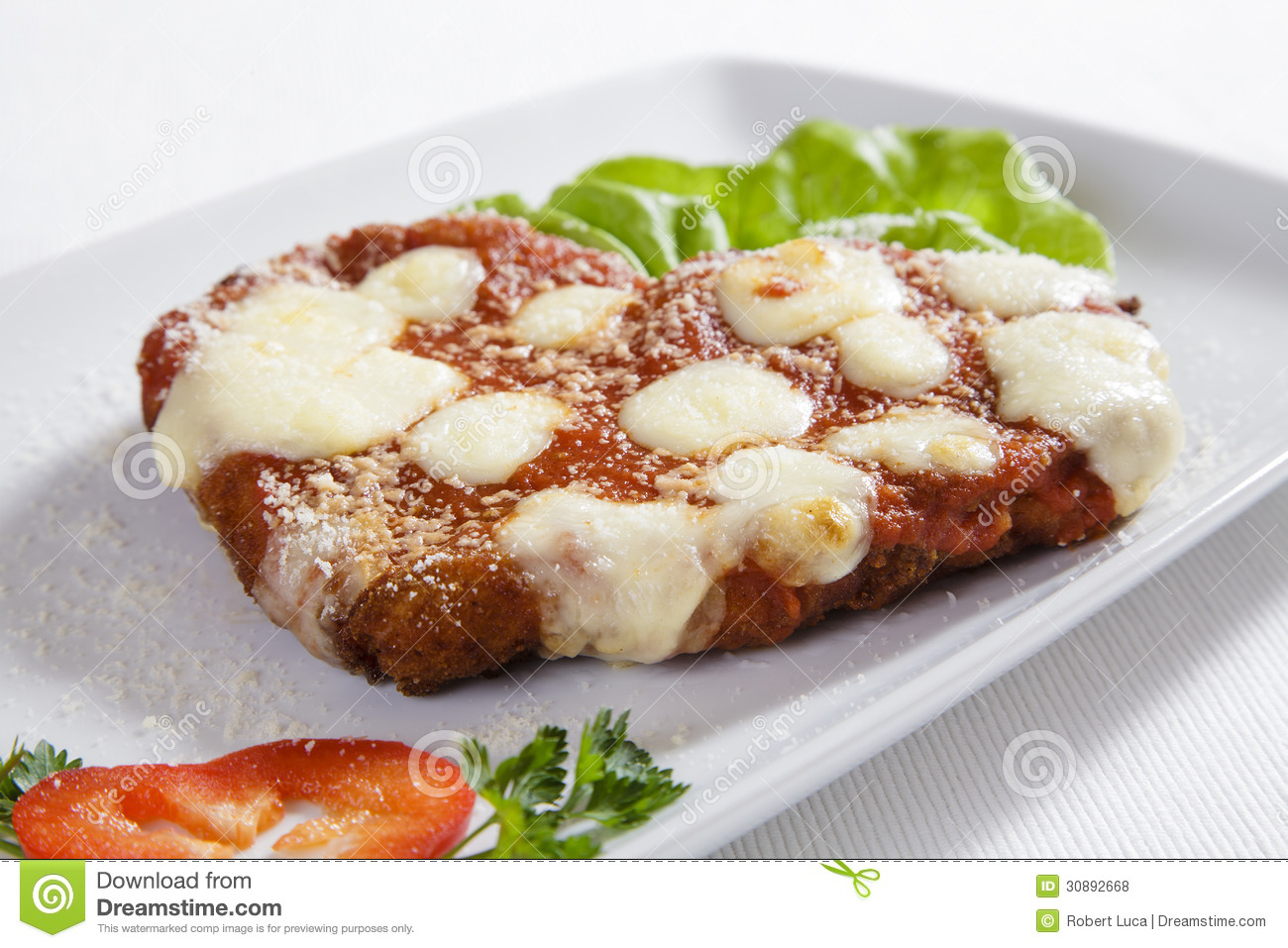 Chicken Parmesan Or Parmigiana With Melting Mozzarella And Parmesan