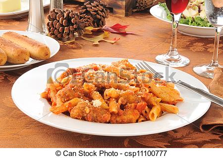 Chicken Parmigiana And Penne With Waldorf Salad On A Holiday Table