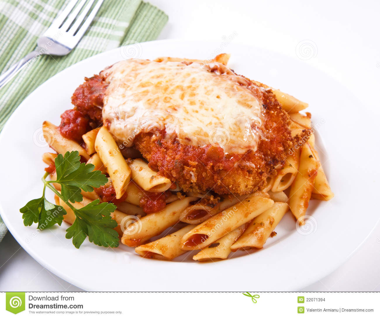 Chicken Parmigiana Served On Top Of Pasta With Marinara Sauce