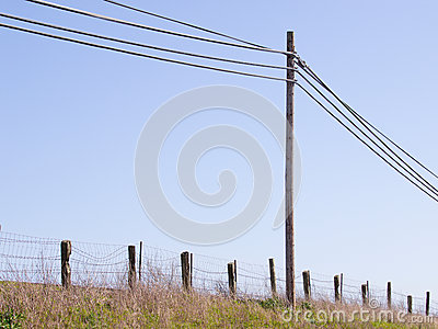 Simple Elements In A Rural Scene  Telephone Pole And Wires  Wire Fence