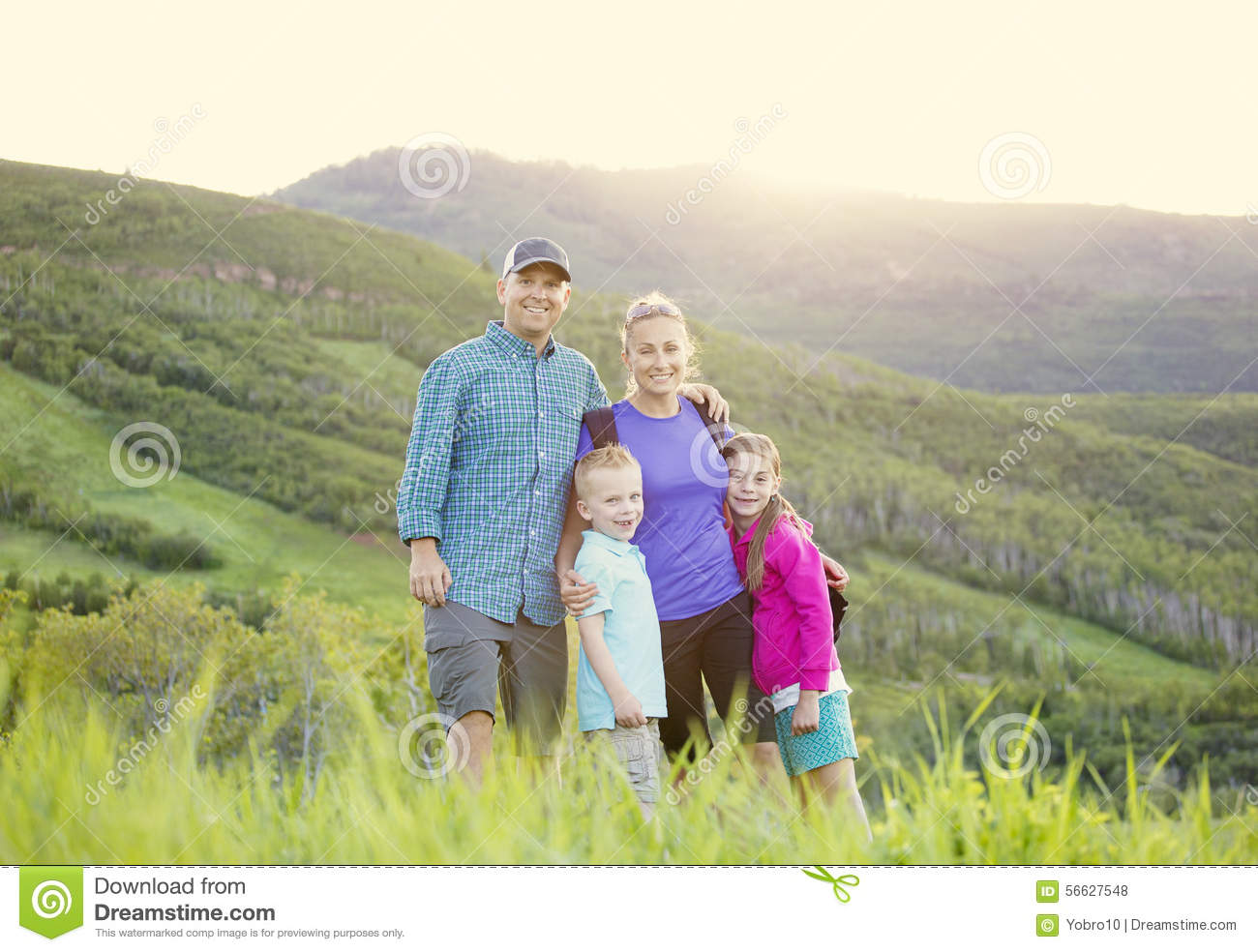 Beautiful Young Family On A Hike In The Mountains Stock Photo   Image