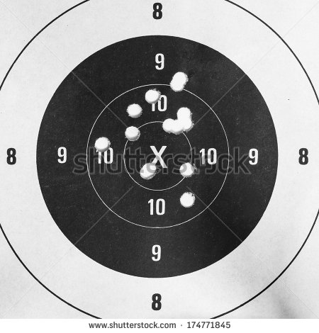 Up Of A Shooting Target And Bullseye With Bullet Holes 174771845 Jpg