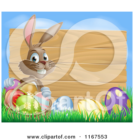 Brown Easter Bunny With Eggs In Grass And A Basket By A Wood Sign With