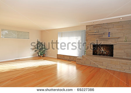 Large Empty Living Room With Stone Fireplace In Asian Style Stock