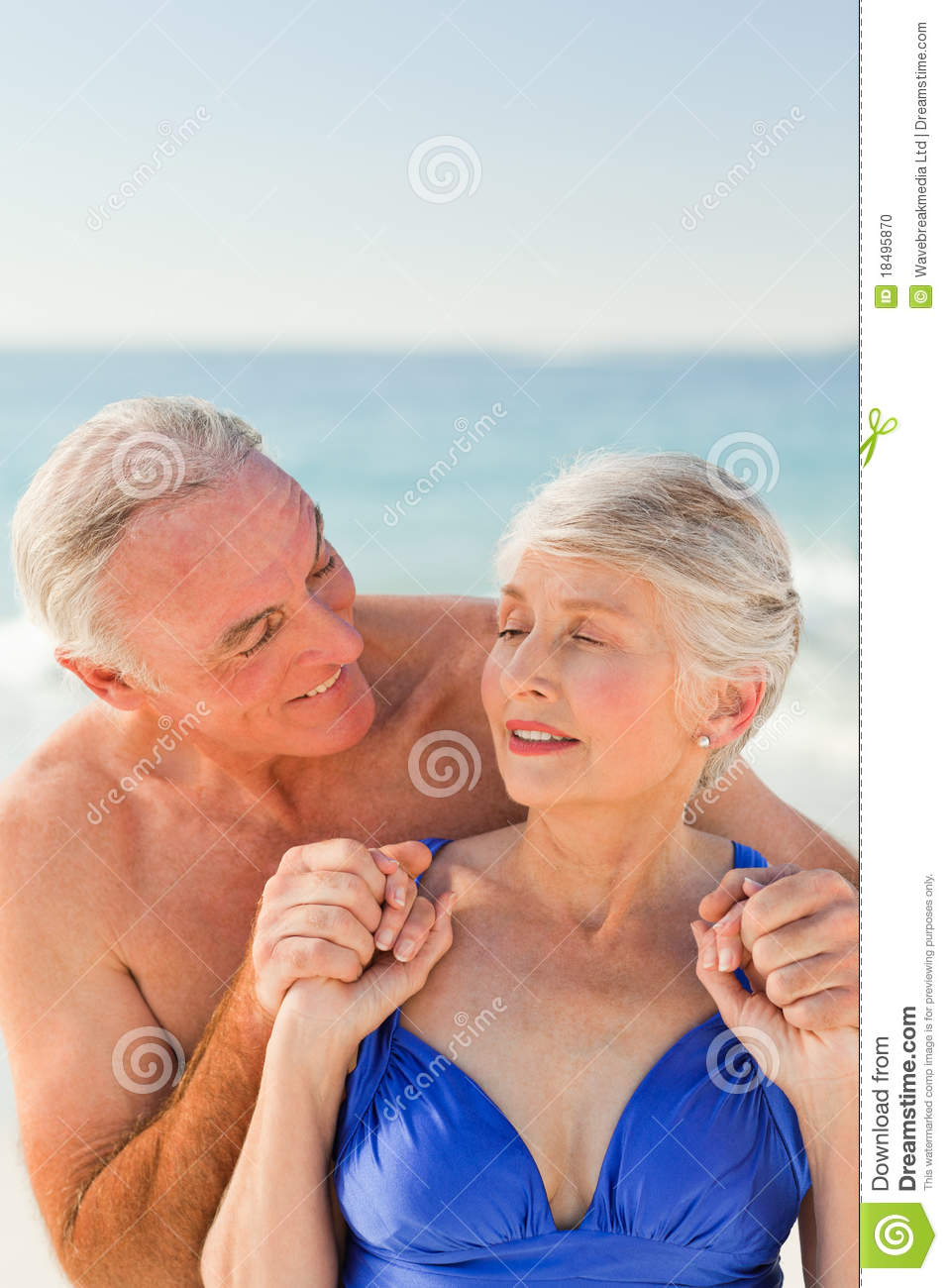 Man Hugging His Wife At The Beach Stock Photo   Image  18495870