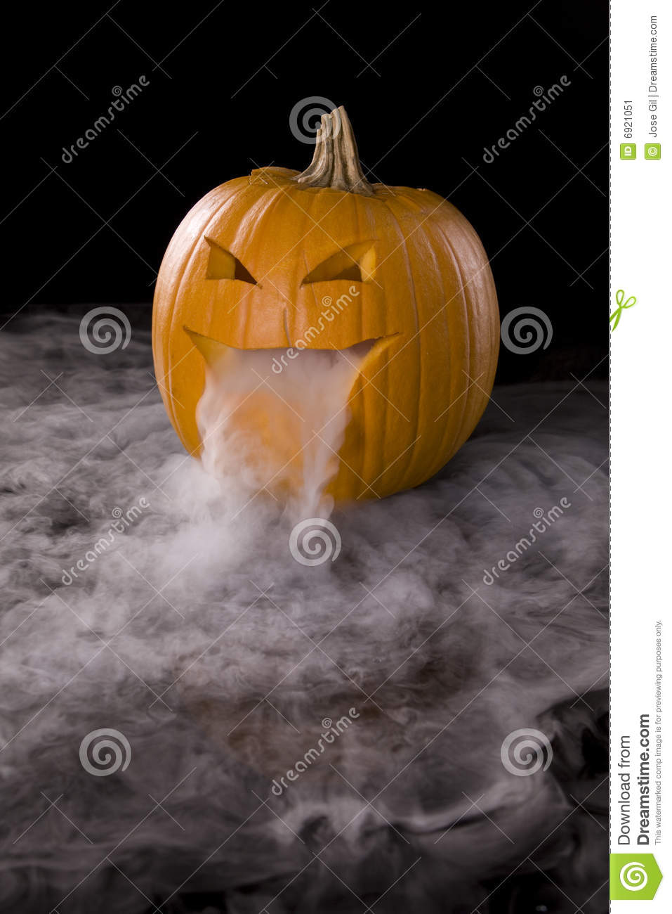 Vertical Image Of A Jack O Lantern With Mist Pouring From It S Mouth