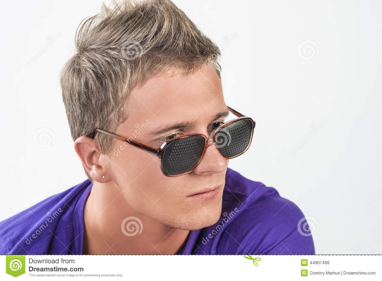 Young Caucasian Man In Eyeglasses Staring Away Stock Photo   Image
