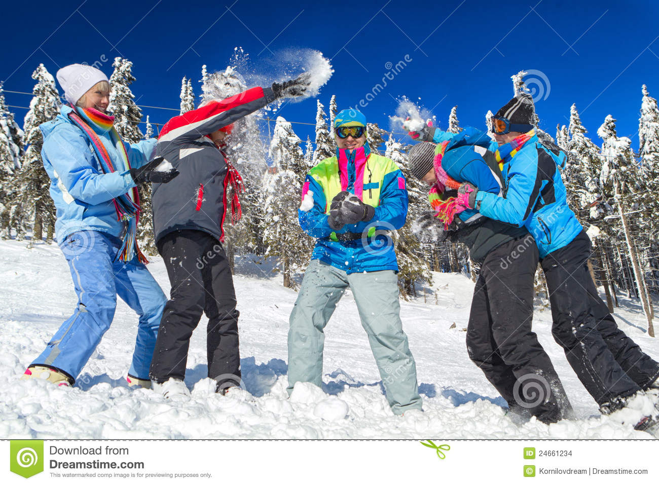 Yuong People Having Snowball Fight In Snow In Winter Background