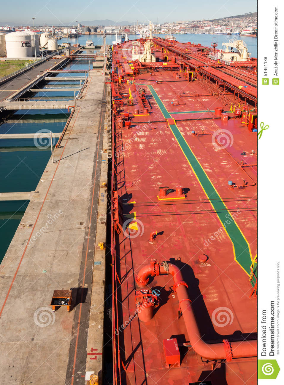 Crude Oil Tanker Moored At Oil Terminal