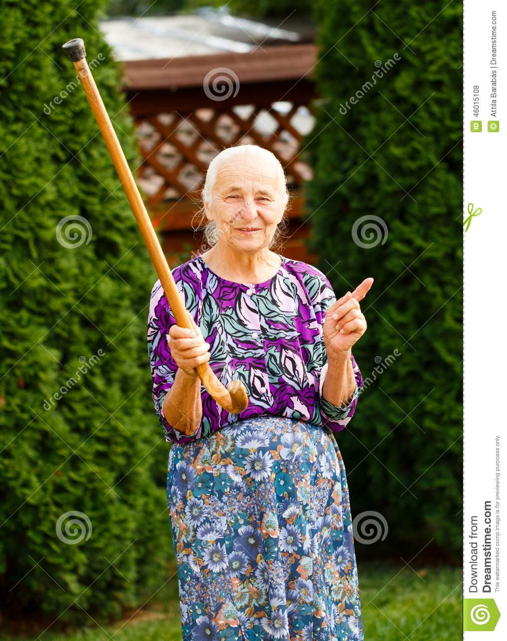 Funny Grandmother Threatening With Her Walking Stick
