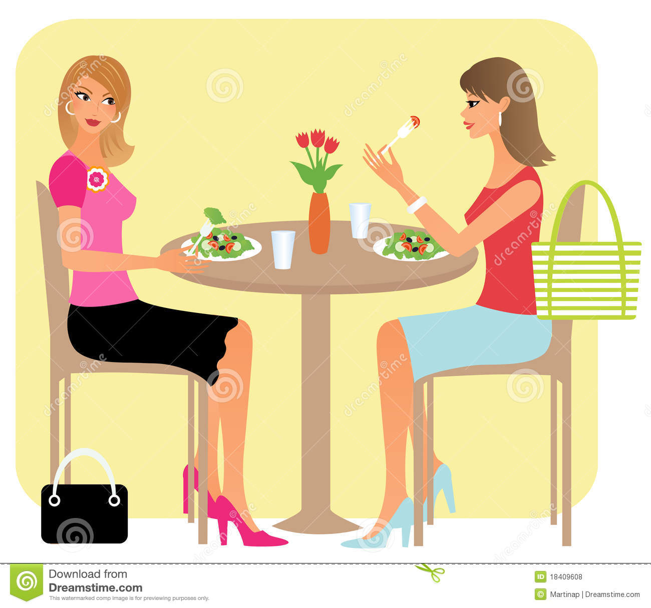 Two Attractive Girl Friends Chatting Over Their Lunch In A Restaurant