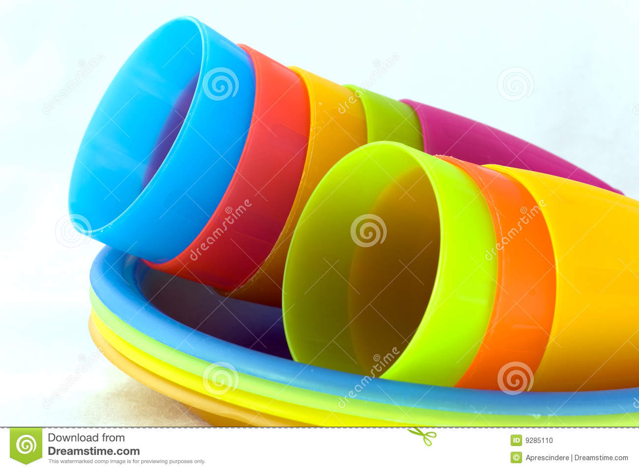 Stack Of Plastic Cups And Plates For Picnic Or Children Meal