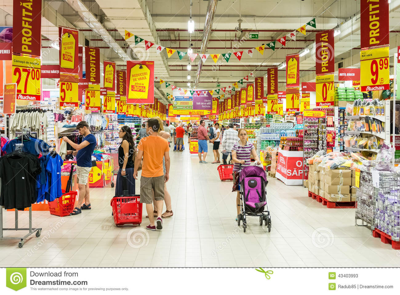 Romania   August 10 2014  People Shopping In Supermarket Store Aisle