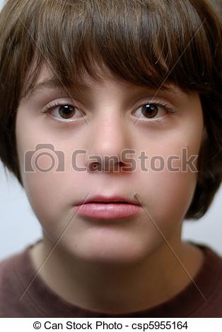 Stock Photo   Twelve Year Old Boy With Big Brown Eyes   Stock Image