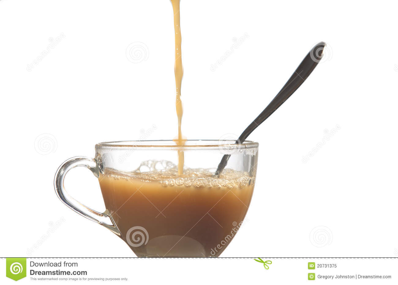 Pouring Coffee Into A Glass Cup Against A White Background