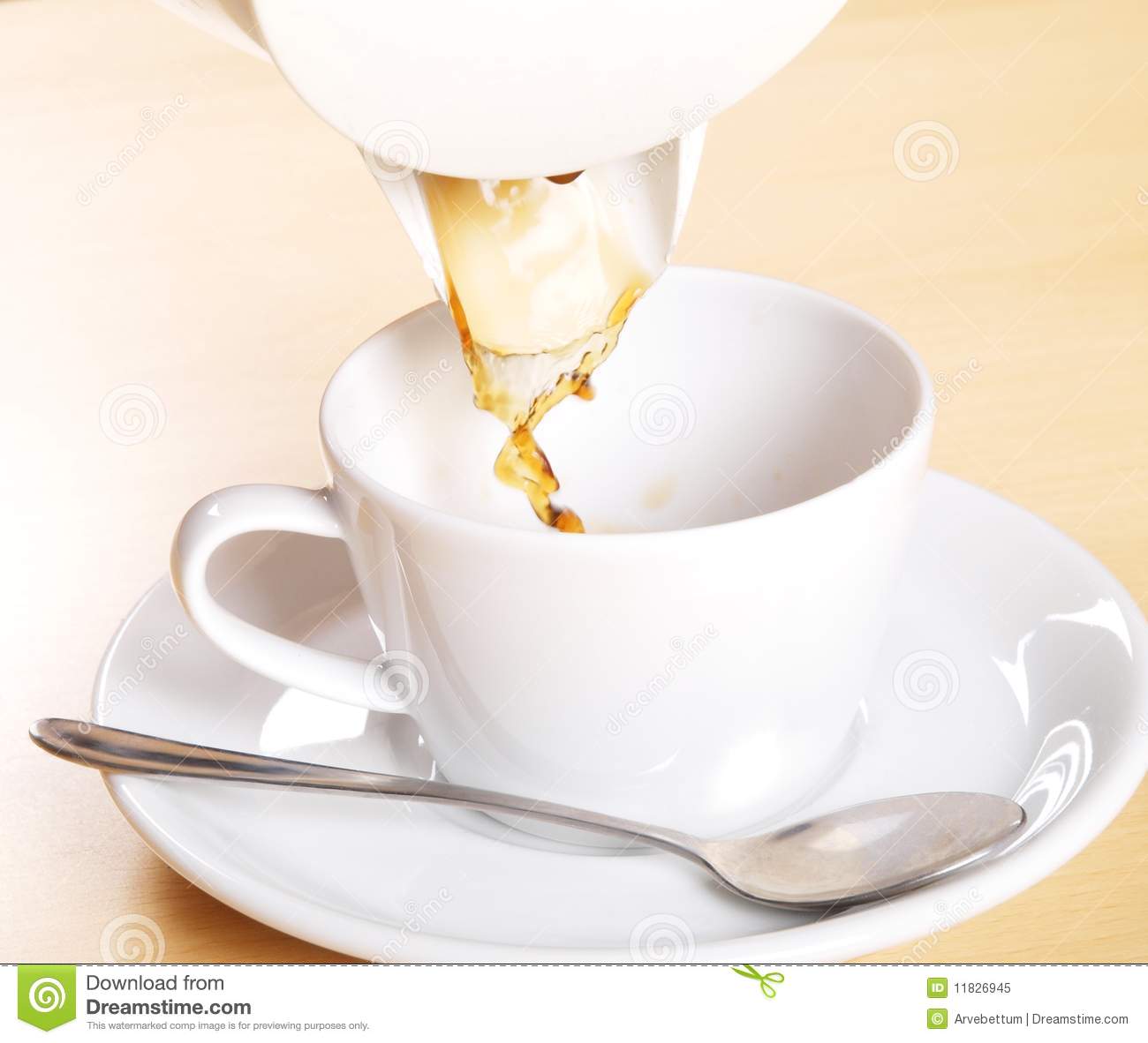 Pouring Coffee White Coffeecup And White Mug With A Tea Spoon On A