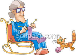 Knitting In Her Rocker With Her Cat   Royalty Free Clipart Picture