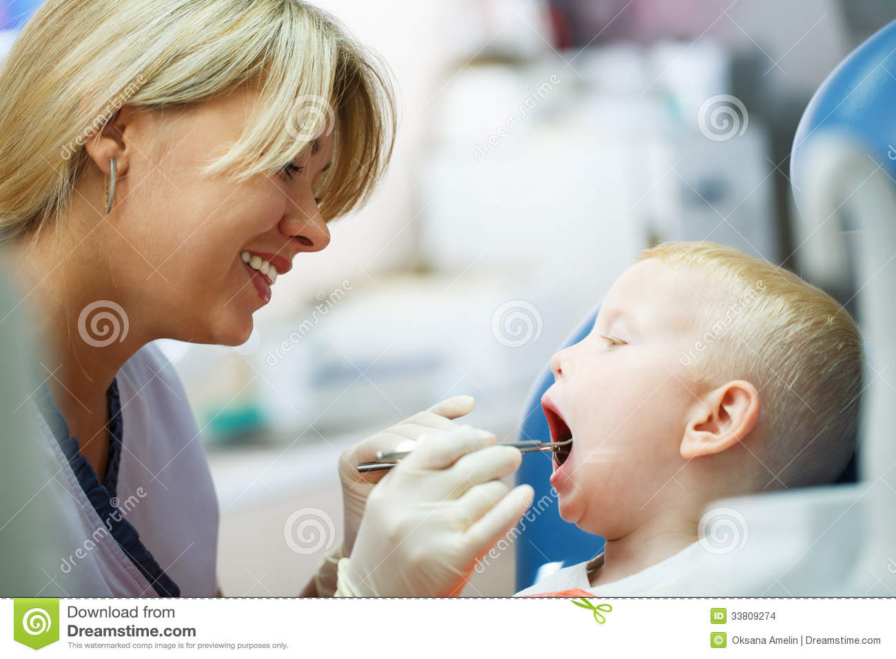 Four Year Old Boy Visits The Dentist At Her Office For A Check Up