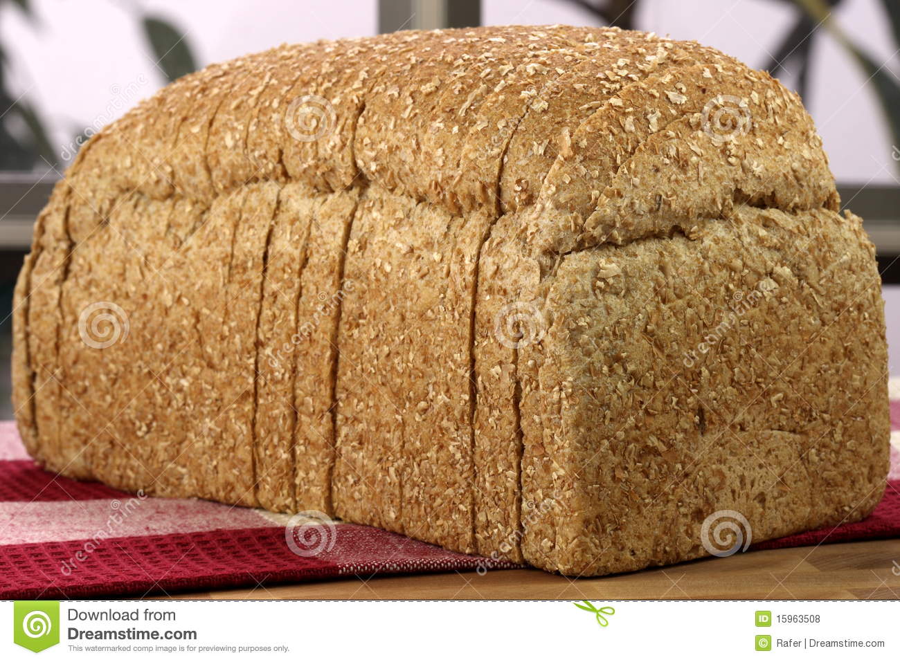 Fresh Baked Whole Grain Bread With Oats Pine Nuts And Lots Of Assorted
