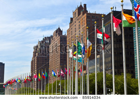 United Nations Headquarters With Flags Of The Members Of The Un Stock