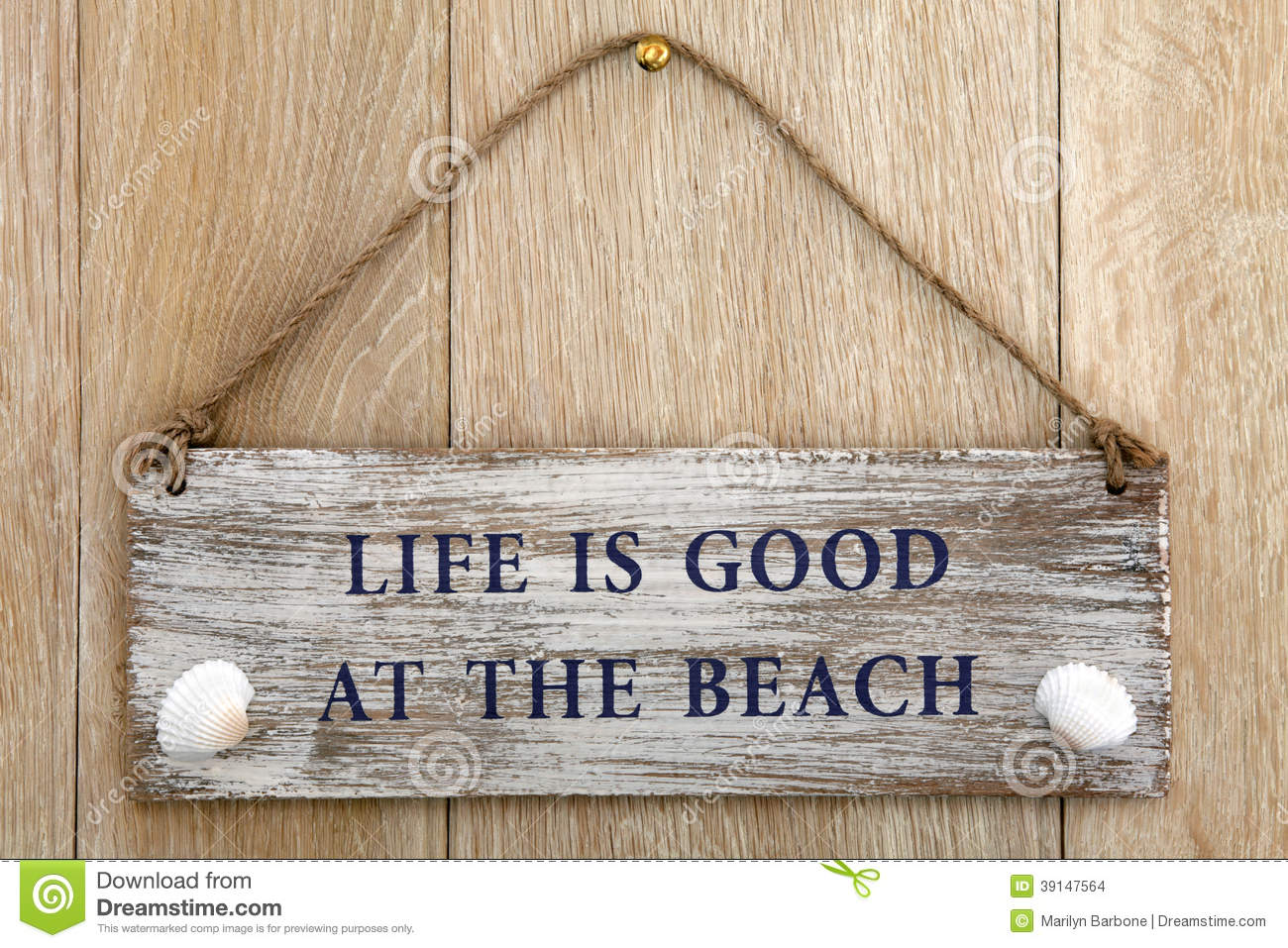 Life Is Good At The Beach Sign Over Oak Wood Background