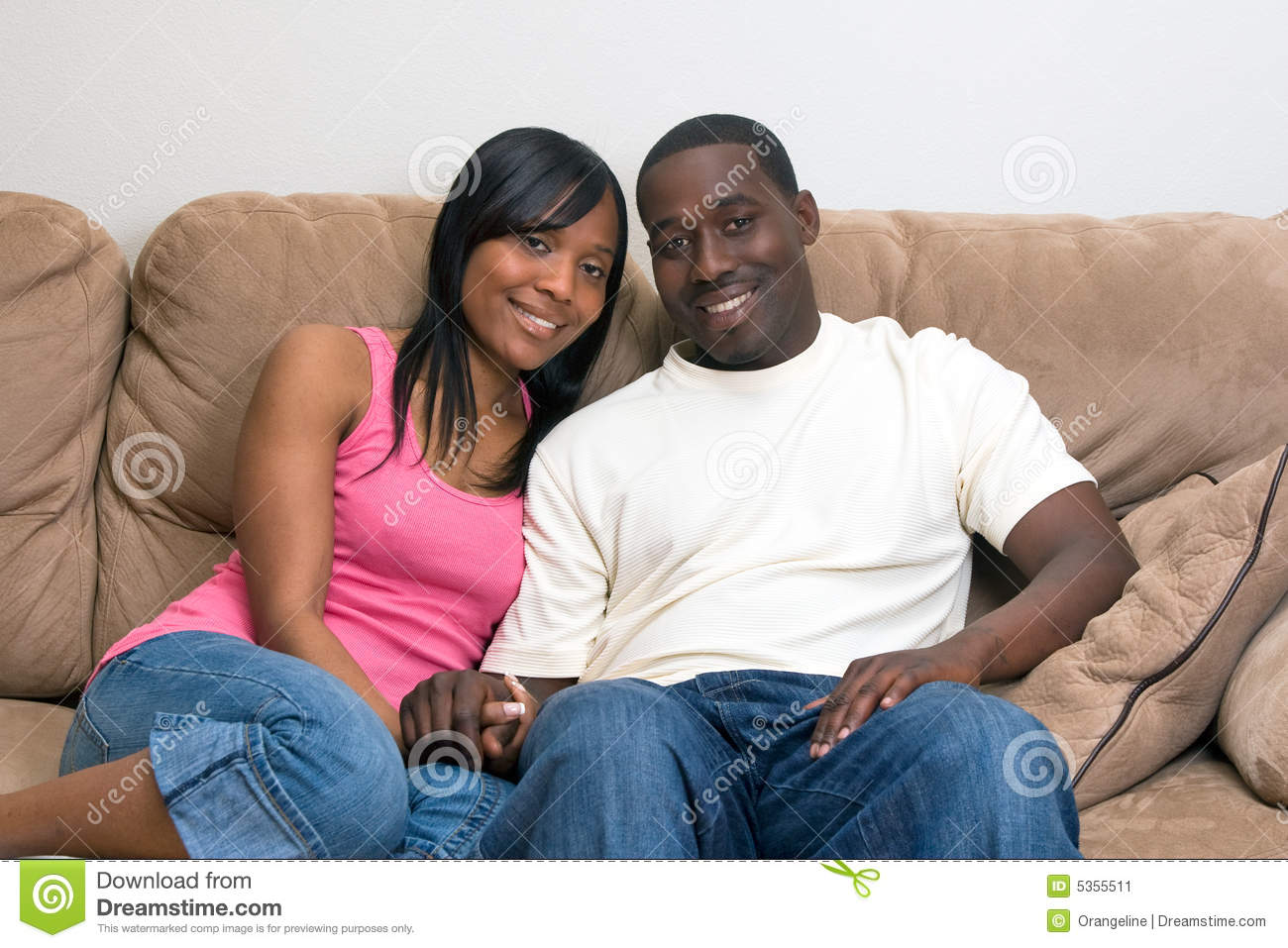 Young Attractive African American Couple Relaxing Together On Their