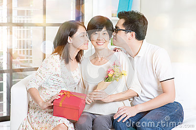 Happy Mothers Day  Asian Boy And Girl Kissing Mother  Family Living
